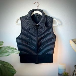 Bebe Cropped Chevron Mesh Insert Puffer Vest